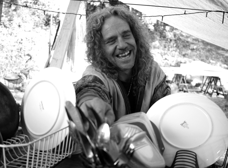 Troy at Hazelnut Grove cleans dishes with a smile Photo © October 2015 Mary Anne Funk and Hazelnut Grove