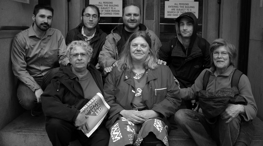 Courtney is surrounded by friends and supporters on the steps of Multnomah County Court house, after her first court date involving her no-cause eviction. Photo by Mary Anne Funk April 12, 2016 Photo by Mary Anne Funk